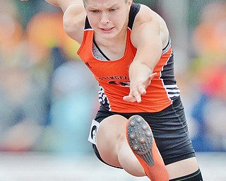 Jeff Lange | The Vindicator SAT, JUN 4, 2016 - Springfield's Courtney Cyrus clears a hurdle in the Division III girls 100 meter hurdles event during Saturday's OHSAA State Track and Field tournament in Columbus.