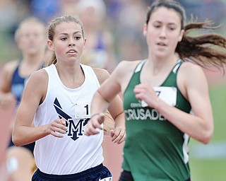 Jeff Lange | The Vindicator SAT, JUN 4, 2016 - McDonald's Malina Mitchell (left) competes in the girls 1,600 meter run during Saturday's OHSAA State Track and Field tournament in Columbus.