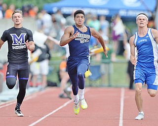 Jeff Lange | The Vindicator SAT, JUN 4, 2016 - Brookfield's Xavier Bailey (center) competes against Mechanicsburg's Bryce Warring (left) and Wynford's Cole Fortner in the boys 200 meter dash during Saturday's OHSAA State Track and Field tournament in Columbus.