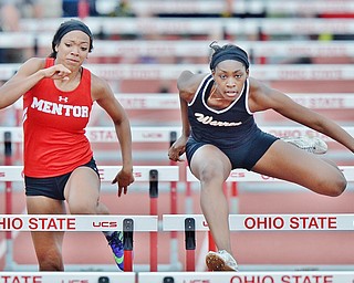 Jeff Lange | The Vindicator SAT, JUN 4, 2016 - Harding's Gariana Bercheni (right) competes against Mentor's Aysha Muhammad in the girls 100 meter hurdles during Saturday's OHSAA State Track and Field tournament in Columbus.