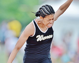 Jeff Lange | The Vindicator SAT, JUN 4, 2016 - Warren Harding's Justice Richardson grits her teeth and leans forward in attempt win the girls 100 meter dash event during Saturday's OHSAA State Track and Field tournament in Columbus. Unfortunately for Richardson, her efforts were not enough as she placed second in the event with a time of 11.89 seconds.