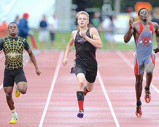 Jeff Lange | The Vindicator SAT, JUN 4, 2016 - Boardman's Brendon Lucas (center) competes against Watkins Memorial's Desmond Melson (left) and Lima Senior's Rico Stafford in the 400 meter dash during Saturday's OHSAA State Track and Field tournament in Columbus.