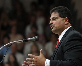 Nikos Frazier | The Vindicator..Alex Geordan, Superintendent of Canfield Local Schools, introduces Judge Robert Rusu at the Canfield High School Graduation.