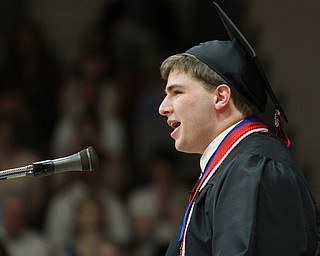 Nikos Frazier | The Vindicator..David Hofsess speaks to his fellow classmates in the Canfield High School Gym. Hofsess graduated from Canfield High School cum laude.