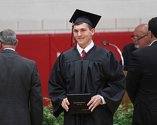 Nikos Frazier | The Vindicator..William Gibson smiles after receiving his diploma from Canfield High School.
