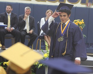 Lowellville High School Valedictorian Rafael Cruz III salutes his classmates after giving his speech during the Lowellville High School commencement on Sunday afternoon.   Dustin Livesay  |  The Vindicator  6/5/16  Lowellville High School.