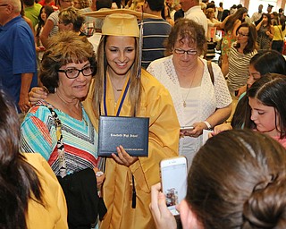 Lowellville graduate Alexandria Coppola (right) poses for a picture with her grtandmother, Carol Coppola (left), after the Lowellville High School commencement on Sunday afternoon.   Dustin Livesay  |  The Vindicator  6/5/16  Lowellville High School.