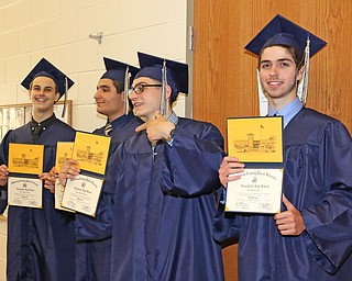 L-R) Lowellville graduates Slade Bower, Joey Micco, Angelo Davanzo, and Vito Bell pose for a picture after the Lowellville High School commencement on Sunday afternoon.   Dustin Livesay  |  The Vindicator  6/5/16  Lowellville High School.