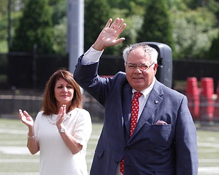        ROBERT K. YOSAY  | THE VINDICATOR..Don Constantini and  Diana D'Alesio   .Don Constantini gives 1 million for the construction of a multimedia center on the East Side of YSU Stambaugh Stadium... - -30-......