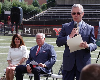        ROBERT K. YOSAY  | THE VINDICATOR.. President Jim Tressel.. .Don Constantini and  Diana D'Alesio   ...Don Constantini gives 1 million for the construction of a multimedia center on the East Side of YSU Stambaugh Stadium... - -30-......