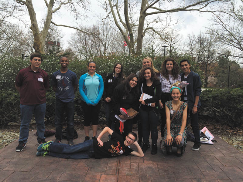 SPECIAL TO THE VINDICATOR
Boardman students in seventh through 12th grade who participated in the English festival at Youngstown State University in April are, Andrew Beichner, lying in front, Candace Gay Essay, honorable mention; in the middle row, Chloe Housteau; Mara Hierro; and Sophia McGee, impromptu writing, honorable mention; and in back, Danny Turillo, writing games, honorable mention and impromptu writing, eighth place; Miles Spearman; Kamryn Flesher; Candace Koellner; Hannah Nawrocki; Emily Maroni, impromptu writing, honorable mention and Candace Gay Essay, fifth place; and David Santiago. Other participants were Mari Sulebi, Not So Trivial Pursuit, third place and Candace Gay Essay, honorable mention; Richard Sammartino, journalism, honorable mention; Judy Garzanich, writing games, fourth place and impromptu writing, honorable mention; Tess Wieser, art competition, honorable mention; and Siena Larrick, Candace Gay Essay, honorable mention. The competition included students from Mahoning, Trumbull, Columbiana, Mercer and Lawrence counties.
