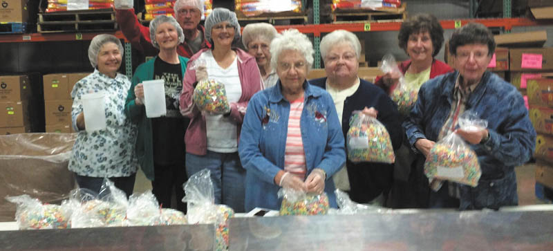 SPECIAL TO THE VINDICATOR
Trumbull Retired Teachers’ Association recently volunteered at Second Harvest Food Bank. Volunteers, from left, are Diane Ross, Sheri French, Charley Stingel, Sue Stingel, Barb Loomis, Elsie Whetzel, Ruby Hawking, Betty Jean Bahmer and Mary Sabol. The group will meet at noon Friday at Ciminero’s Banquet Center in Niles and Aug. 9 at the same location. On July 14 members will volunteer for the annual TRTA Spelling Bee at the Trumbull County Fair. For information visit www.Trumbullrta.blogspot.com and find the recent newsletter.