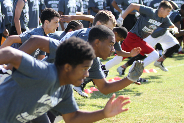 Nikos Frazier | The Vindicator..Players gathered on Thursday, June 9, 2016 to be apart of the Warren Harding Elite Camp and be coached by Michigan  Head Coach, Jim Harbaugh.