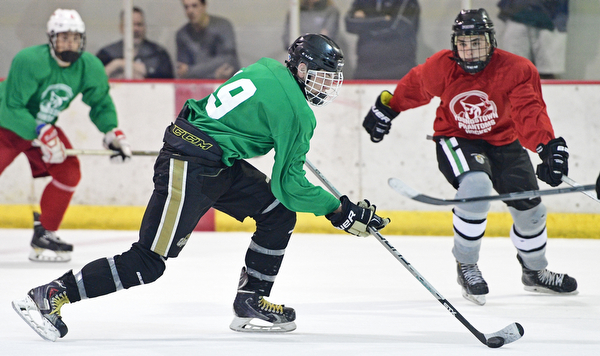 BOARD MAN, OHIO - JUNE 10, 2016: Zach Aughe (green) skate in the open ice during a exhibition game during the Phantoms prospect camp Friday night at the Ice Zone. DAVID DERMER | THE VINDICATOR