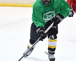 BOARD MAN, OHIO - JUNE 10, 2016: Alexander Miniouchine (green) skates with the puck during a exhibition game during the Phantoms prospect camp Friday night at the Ice Zone. DAVID DERMER | THE VINDICATOR