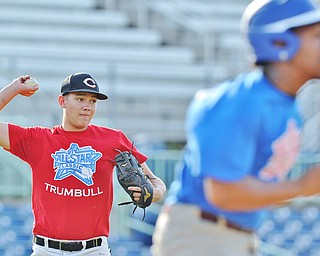Jeff Lange | The Vindicator  FRI, JUN 10, 2016 - Trumbull County pitcher Tommy Kirin of Chalker looks to make a throw to first after fielding a ground ball to put out Mahoning County's Jonathoan Griffin of Liberty in the fifth inning of Friday's Valley High School All Star Classic at Eastwood Field in Niles.