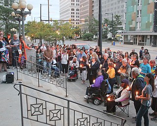 William D. Lewis the Vindicator Mayor John McNally speaks during a candlelight vigil in Youngsotwn June 13, 2016 to remember Orlando shooting victims.