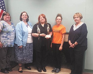 SPECIAL TO THE VINDICATOR
The American Association of University Women-Youngstown Branch recently gave a check for summer camp scholarships to the YWCA to help girls advance their education and self-development. Representatives present for the donation were, from left, Denise Walters Dobson, AAUW second vice president; Kathie Nalepa, AAUW treasurer; Jorine Stone, AAUW president; Jennie Andrews, YWCA program manager; and Regina Jenkins, AAUW secretary. This year, YWCA summer camps offered to both boys and girls will focus on manufacturing, hip-hop dance, art, anti-bullying and self-defense, and computers with Make Your Own App and Raspberry Pi camps offered in conjunction with the Oakhill Collaborative. AAUW also plans to donate to STEM camps at Youngstown State University. For information on the camps, call the YWCA at 330-746-6361. For information on AAUW membership or services, call Denise at 330-747-1970 or 330-941-7272.