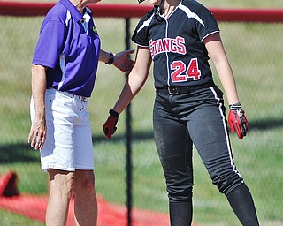 Jeff Lange | The Vindicator  TUE, JUN 14, 2016 - Champion softball coach Cheryl Weaver (left) congratulates Mathews' Meredith Grimes at third in the fourth inning of game one of Tuesday's 13th annual Bill Sferra Softball Classic at YSU.