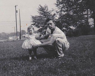 This photo was taken of Michelle Jaminet and her father, Ray Jaminet, on her first birthday in September 1956..