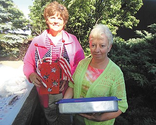 SPECIAL TO THE VINDICATOR
Darlyn Gardiner, left, vice president and Sue Stoddart, member of the Upton Association, are sorting items for the summer garage sale that will take place 9 a.m. to 4 p.m. July 8 and 9 at the Harriet Taylor Upton House, 380 Mahoning Ave., downtown Warren. The sale will benefit the historical home of suffragette Harriet Taylor Upton. Upton House will be open for a music and art hop from 3 to 6 p.m. Saturday. Open houses will be from 2 to 4 p.m. July 3 with a Christmas in July display and Aug. 7 with the home decorated in gold. For information visit www.uptonhouse.org.