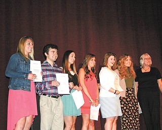 SPECIAL TO THE VINDICATOR
In her will, Kathryn Brandeberry, a former teacher, allotted funds for the valedictorians of Newton Falls High School. Valedictorians who received scholarships this year are, Katelyn Wainwright, left, Joe Agati, Sarah Dubos, Jessica Woods, Caitlyn Wolford and Natalie Georgalas and Kiwanis presenter, Kathy Wujcik. The Kiwanis Club of Newton Falls oversees the scholarship account.