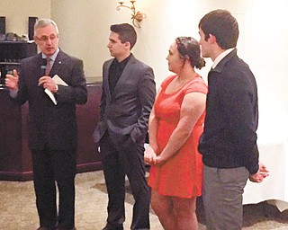 SPECIAL TO THE VINDICATOR
The Wolves Club of Youngstown gathered May 6 for its annual scholarship banquet. The opening address was given by Youngstown State University President Jim Tressel, left. Here he addresses scholarship recipients Brandon Rozzi, Boardman High School; Kristen Kopnicky, Lowellville; and Alex Schill, Canfield.