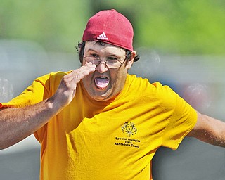 Jeff Lange | The Vindicator  SAT, JUN 18, 2016 - Ashtabula County's John Henson sprints down the track as he competes in the 400 meter walk during Saturday's Special Olympics at Austintown Fitch High School.
