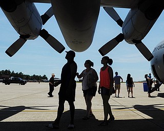 Jeff Lange | The Vindicator  SAT, JUN 18, 2016 - Visitors examine the underside of a C-130 Hercules wing during an open house at the Youngstown Air Reserve Station in Vienna on Saturday.