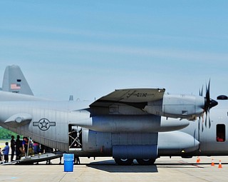 Jeff Lange | The Vindicator  SAT, JUN 18, 2016 - Visitors wait in line to tour the inside of a C-130 Hercules during the open house a the Youngstown Air Reserve Station in Vienna on Saturday.