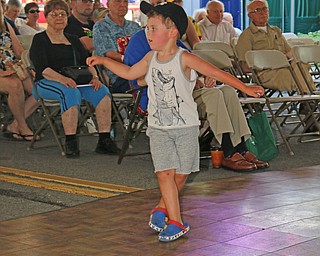 Jack Miner (4) of Lowellville dances along while a band plays during the Simply Slovak festival in downtown Youngstown on Saturday afternoon.  Dustin Livesay  |  The Vindicator  6/18/16  Youngstown