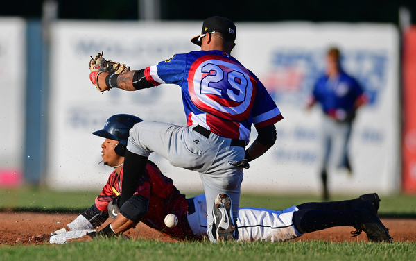 NILES, OHIO - JUNE 18, 2016: Base runner Todd Isaacs #6 of the Scrappers steals second base after short stop Stephen Alemais #29 of the Black Bears drops the ball in the third inning of Saturday nights game at Eastwood Field. DAVID DERMER | THE VINDICATOR
