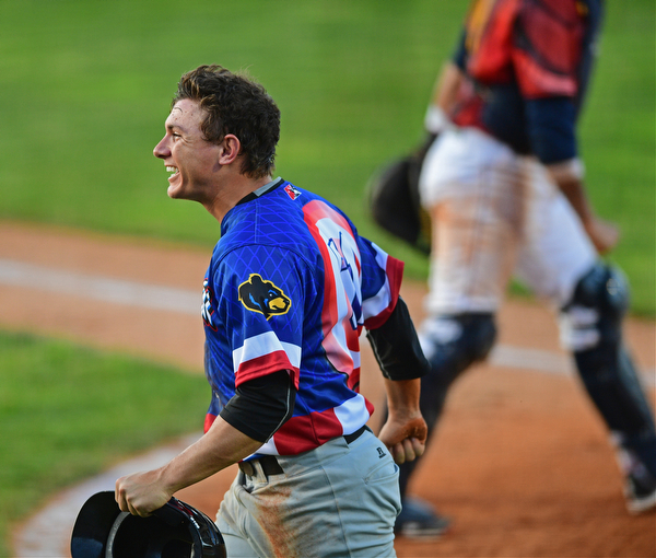 NILES, OHIO - JUNE 18, 2016: Base runner Ty Moore #51 of the Black Bears celebrates after stealing home plate in the sixth inning of Saturday nights game at Eastwood Field. DAVID DERMER | THE VINDICATOR