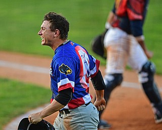 NILES, OHIO - JUNE 18, 2016: Base runner Ty Moore #51 of the Black Bears celebrates after stealing home plate in the sixth inning of Saturday nights game at Eastwood Field. DAVID DERMER | THE VINDICATOR
