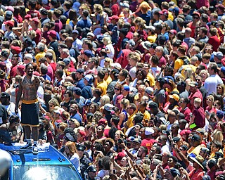 CLEVELAND, OHIO - JUNE 22, 2016: J.R. Smith of the Cleveland Cavaliers smiles while fans chant his name while he waves to the during the Cavaliers Championship Parade Wednesday afternoon. DAVID DERMER | THE VINDICATOR