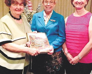 SPECIAL TO THE VINDICATOR
Mahoning Retired Teachers Association recently met for its annual In Memoriam program at Antone’s Banquet Center in Boardman. All members who died in 2015-2016 were remembered. A National Geographic book “The National Parks” has been purchased in behalf of the John M. Knapick Memorial to honor deceased members. It will be a part of the permanent collection of the Public Library of Youngstown and Mahoning County. Among those attending the program, from left, were Sally Knapick Winsen, In Memoriam chairman; Susan Harris, MRTA president; and Martha Lopez, Remembrance chairman. Mary Jane Lewis is MRTA historian.
