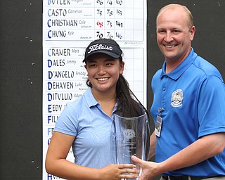 Nikos Frazier | The Vindicator..Kristen Chen, of Thousand Oaks, Calif., shakes Brian Tolner, Mill Creek MetroParks Director of Golf after placing third in the Mill Creek Foundation Junior All-Star.