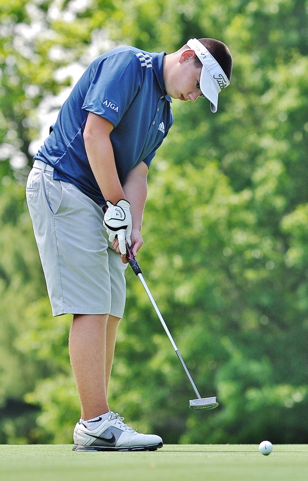 Jeff Lange | The Vindicator  FRI, JUN 24. 2016 - Boardman's Cole Christman putts on the eleventh hole during Friday's Greatest Golfer of the Valley Junior competition at Tam O'Shanter Golf Course in Hermitage, Pa.