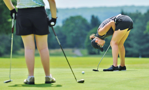 Jeff Lange | The Vindicator  FRI, JUN 24. 2016 - Emily Koehler of Mathews reacts in frustration as her putt comes up short during Friday's Greatest Golfer of the Valley Junior competition at Tam O'Shanter Golf Course in Hermitage, Pa.