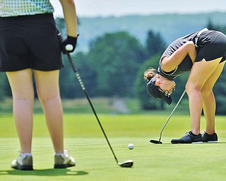 Jeff Lange | The Vindicator FRI, JUN 24. 2016 - Emily Koehler of Mathews reacts in frustration as her putt comes up short during Friday's Greatest Golfer of the Valley Junior competition at Tam O'Shanter Golf Course in Hermitage, Pa.