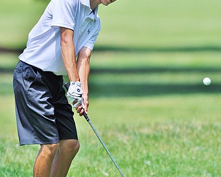 Jeff Lange | The Vindicator FRI, JUN 24. 2016 - Columbiana's Jared Wilson watches his chip to the green during Friday's Greatest Golfer of the Valley Junior competition at Tam O'Shanter Golf Course in Hermitage, Pa.