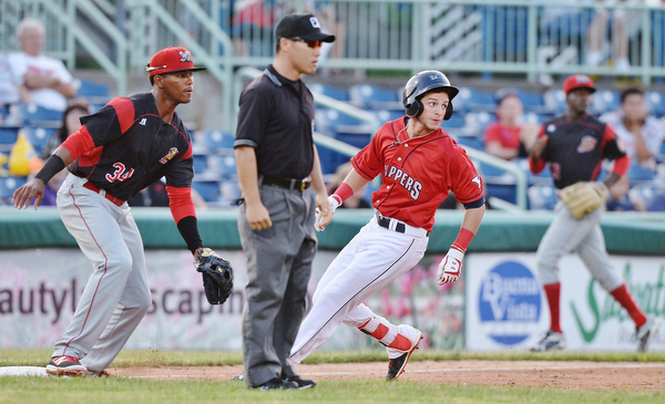 Jeff Lange | The Vindicator  SAT, JUN 25, 2016 - Scrappers Alexis Pantoja (right) looks to right field after hitting a 2 RBI line drive triple to right field in the bottom of the fourth inning as Batavia's Garvis Lara (34) looks on. Mahoning Valley scored 6 in the fourth inning to make the score 9-4