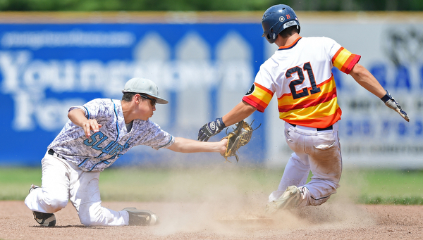 STRUTHERS, OHIO - JUNE 26, 2016: Tyler Conova #21 of Astro steals second base beating the tag from Jake McCaskey #21 of the Scurve allowing a run to score from third in the third inning of Sunday afternoons Bob Cene Tournament Championship game. Astro won 11-1. DAVID DERMER | THE VINDICATOR