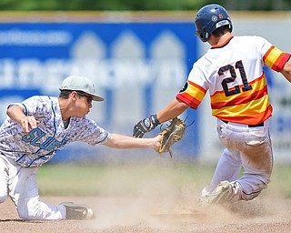 STRUTHERS, OHIO - JUNE 26, 2016: Tyler Conova #21 of Astro steals second base beating the tag from Jake McCaskey #21 of the Scurve allowing a run to score from third in the third inning of Sunday afternoons Bob Cene Tournament Championship game. Astro won 11-1. DAVID DERMER | THE VINDICATOR