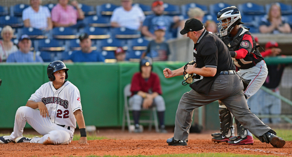 NILES, OHIO - JUNE 27, 2016: Luke Wakamatsu #22 of the Scrappers is called out by home plate umpire James Folske after being tagged by catcher Pablo Garcia #7 of the Muckdogs during the fifth inning of Monday nights game at Eastwood Field. DAVID DERMER | THE VINDICATOR