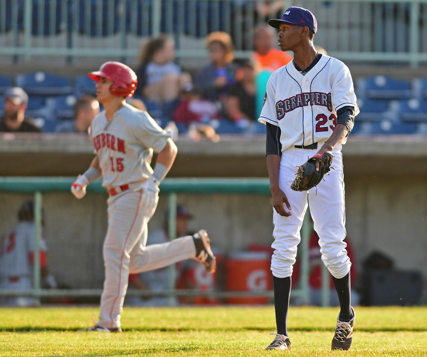 NILES, OHIO - JUNE 28, 2016: Starting pitcher Triston McKenzie(23) of the Scrappers shows his frustration while Tres Berrera(15) of the Doubledays trots the bases after a solo home run in the second inning of Tuesday nights game at Eastwood Field. DAVID DERMER | THE VINDICATOR