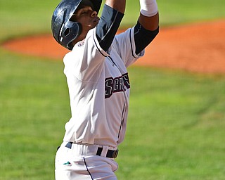 Erlin Cerda(4) of the Scrappers celebrates after hitting a solo home run in the first inning of Wednesday nights game at Eastwood Field. DAVID DERMER | THE VINDICATOR
