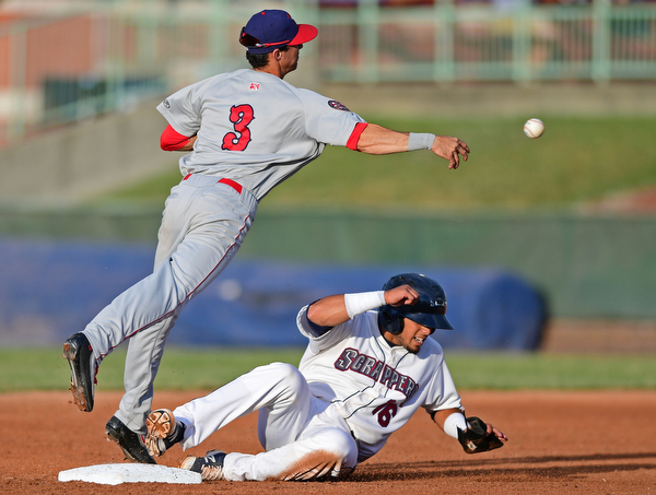 Clayton Brandt(3) of the Doubledays throws the ball to first to turn a double play after forcing out Gian Paul Gonzalez(16) of the Scrappers in the third inning of Wednesday nights game at Eastwood Field. DAVID DERMER | THE VINDICATOR