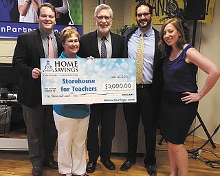 SPECIAL TO THE VINDICATOR
Home Savings Charitable Foundation of Youngstown recently donated $5,000 to the Education Partnership to support schools in Beaver County, Pa. Education Partnership addresses educational inequalities in low income neighborhoods by partnering with organizations like Home Savings to provide the tools and resources needed to support teachers and enhance a student’s ability to learn and succeed. From left are Charlie Hunter, community relations manager of Education Partnership; Peggy Wolstoncroft, director of advancement of Education Partnership; Justin Brown, executive director of Education Partnership; Rick Hughes, regional sales manager of Home Savings Mortgage Division; and Cari Goss Quinn, donor relations associate of Education Partnership.