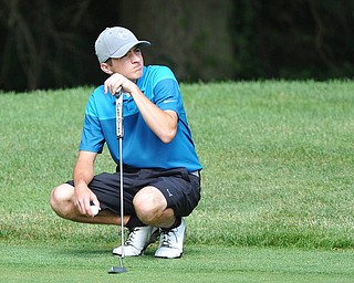Michael Butch of Ursuline watches his competitors during Wednesday's 2016 Flynn Auto Group Junior Greatest Golfer of the Valley tournament Wednesday at Mill Creek South Course. Butch placed U-17...--Jeff Lange | The Vindicator  WED, JUN 29, 2016